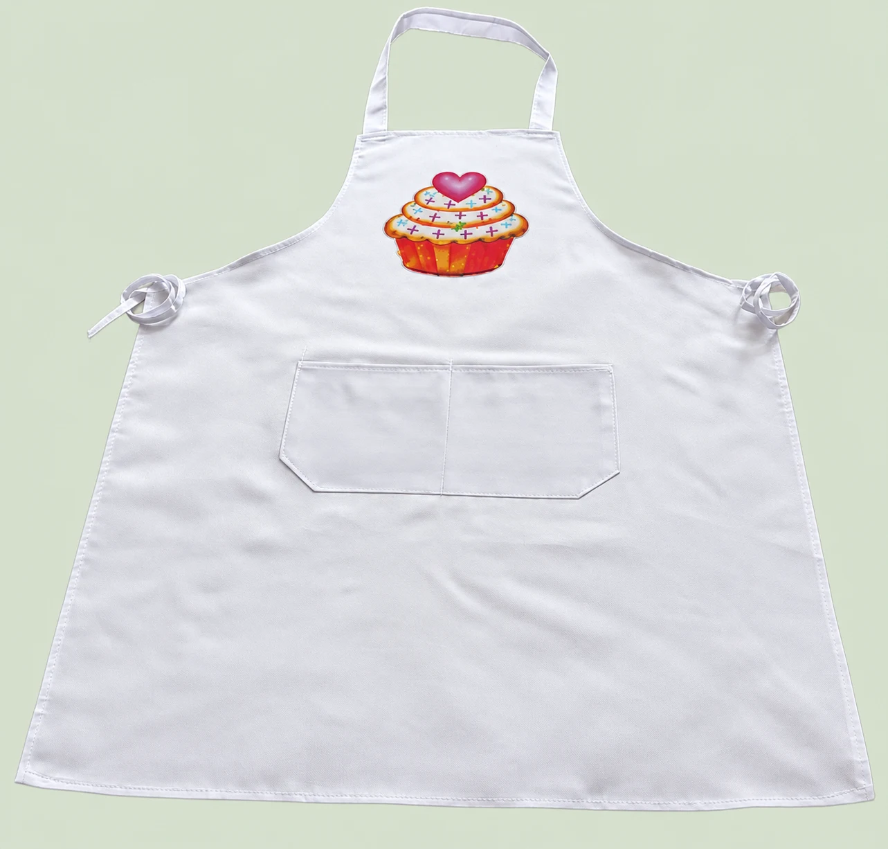 Adult Apron with a cupcake design on a light sage green background