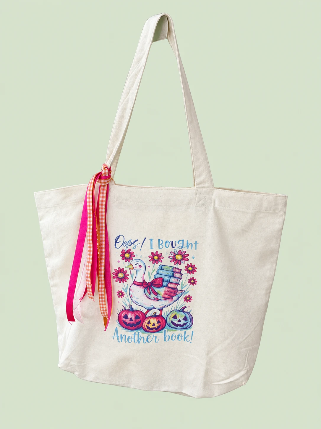 Personalized tote bag on a light sage green background