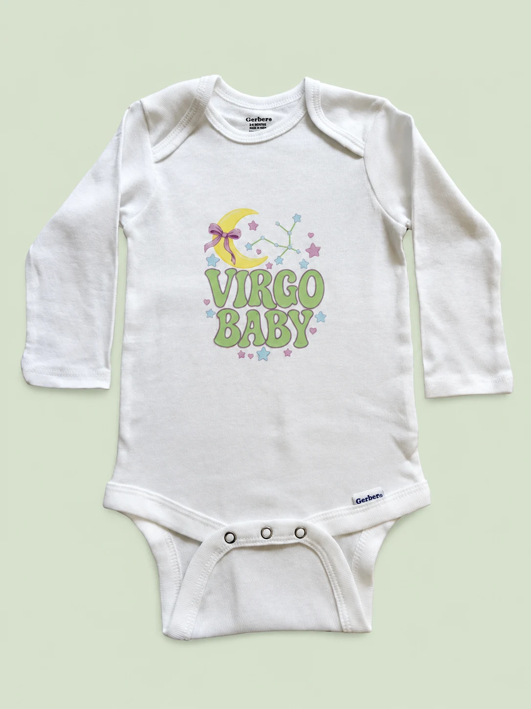 Virgo Baby onesie on a light sage green background